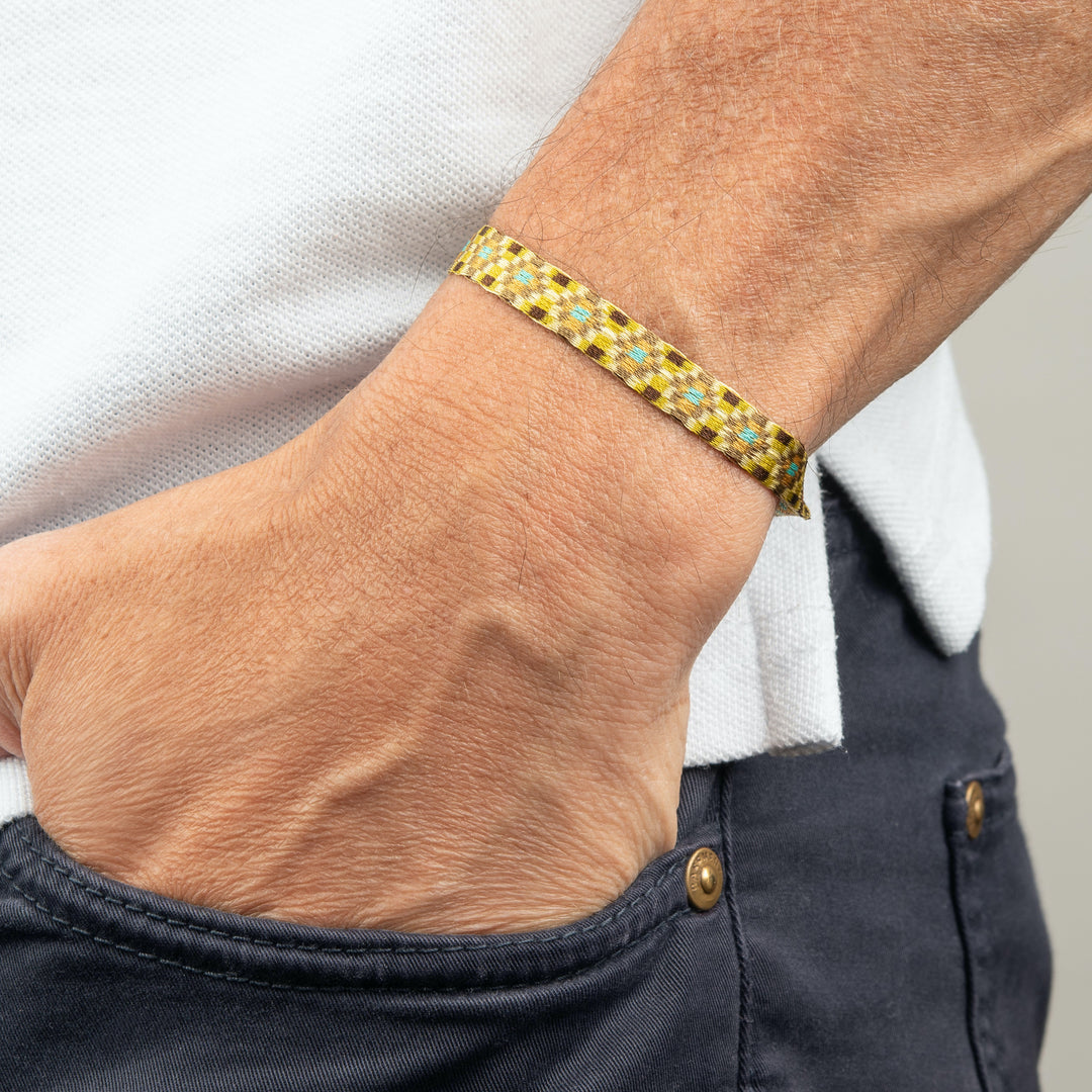 Handwoven Egyptian Loom Golden Yellow Tribal Surfer Bracelet on wrist.