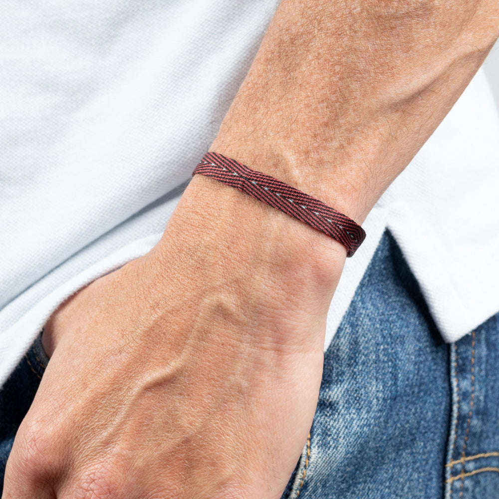Handwoven Egyptian Loom Red and Black Surfer Bracelet on wrist