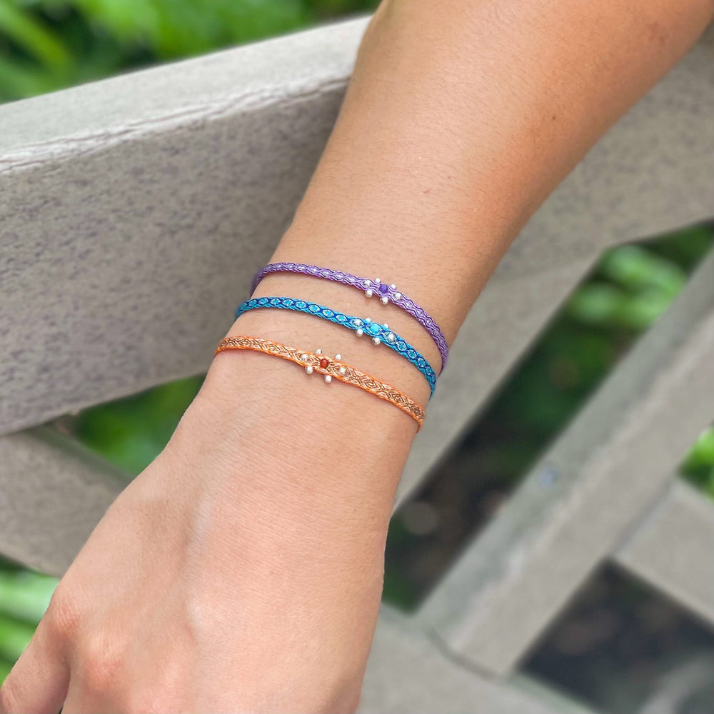 Adjustable Egyptian Loom Beaded Centered Chakra Bracelets Blue, With gemstones in the center and sterling silver beads on model